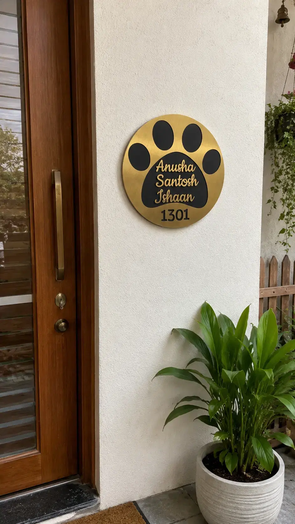 Front door styled with a personalised name plate